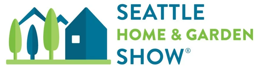 Seattle Home & Garden Show logo with a blue house and green trees, featuring the words “SEATTLE HOME & GARDEN SHOW” in teal and green.