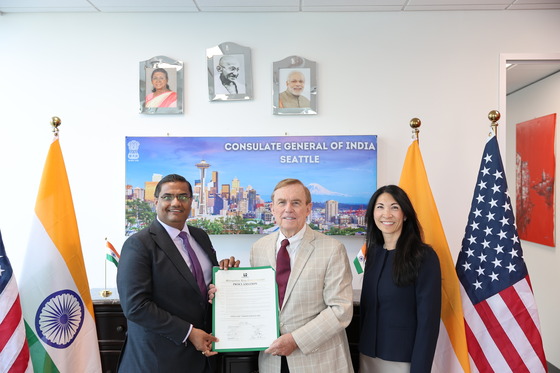 Councilmember Fain with Councilmember Von Reichbauer and Consul General of India posing with a proclamation
