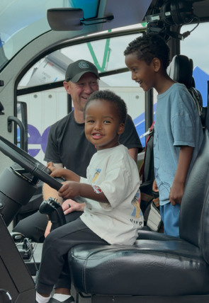 Touch a Truck 2026 cute kid driving ARFF vehicle