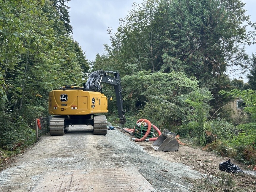 Heavy construction equipment on the trail.
