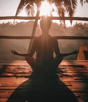 meditation silhouette sunset