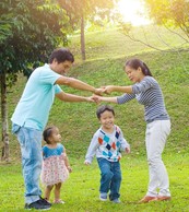Asian family play outdoors