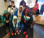 KCSO coat giveaway Alajawan Brown center 2023