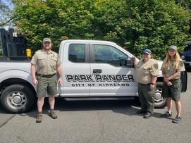 Park Rangers posing for picture