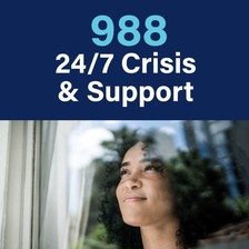 988 24/7 support with woman smiling out window