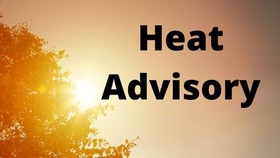 sun with words heat advisory