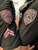 Police Wearing Pink Patches