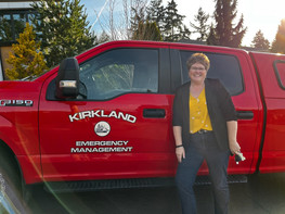 Heather Kelly with City Emergency Vehicle
