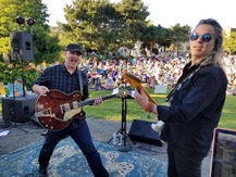 summer concert series guitarists and audience