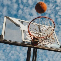 basketball ball into hoop