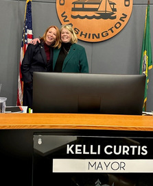 Kelli Curtis and Penny Sweet in Council Chambers