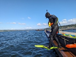 Water Rescue Diver Jumping off Dock