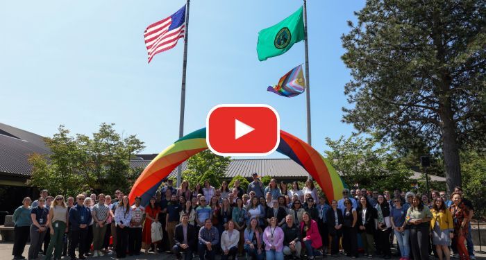 pride flag raising 2025 with play button