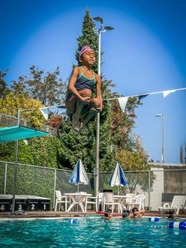 peter kirk pool child jumping into pool