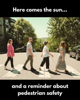 waterfront pedestrian safety crosswalk here comes the sun