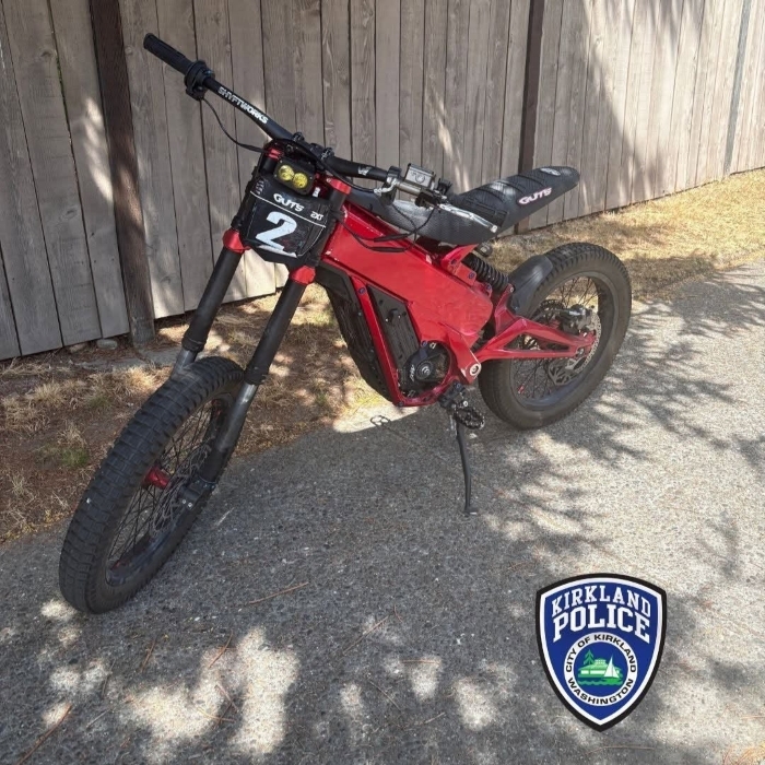 Image of an e-bike with the Kirkland Police Department logo in the corner