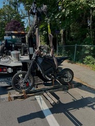 Image shows an e-motorcycle being impounded by Kirkland Police