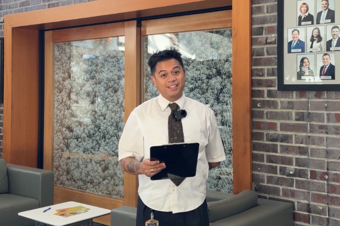 Video still showing City staff member explaining City Hall for All