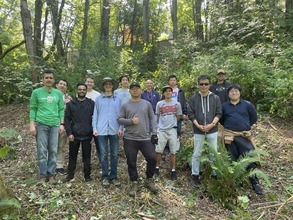 Green Kirkland volunteers pose together at Highlands Open Space 1 Park