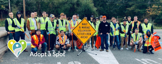 Volunteers posing before group Adopt a Spot litter cleanup on Clear Creek Rd.