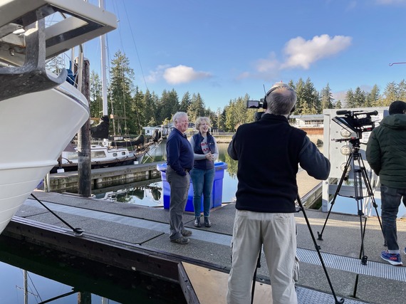 Behind the scenes lighted boat parade