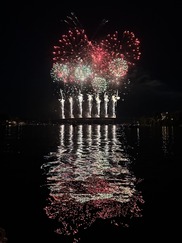 fireworks light up the night sky from the Manette Bridge