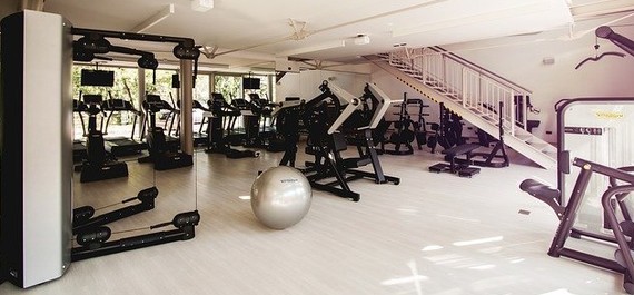 empty gym with exercise equipment