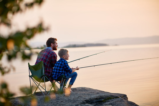 Father and son fishing.