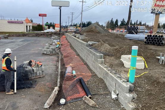 Placing a retaining wall on the South side of 196th St SW between 48th Ave W and 44th Ave W