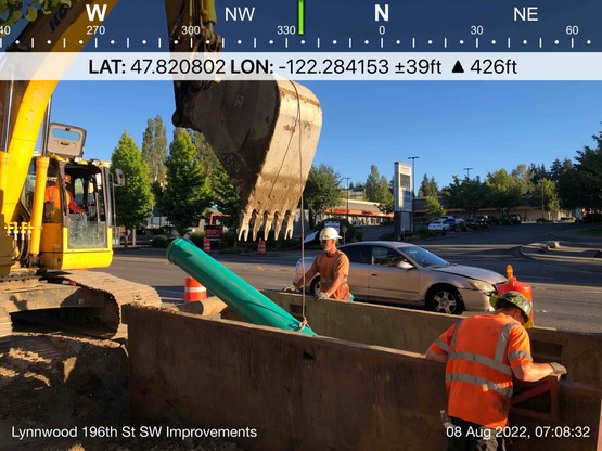 Crews place drainage pipes on the south side of 196th St SW between 36th Ave W and 40th Ave W