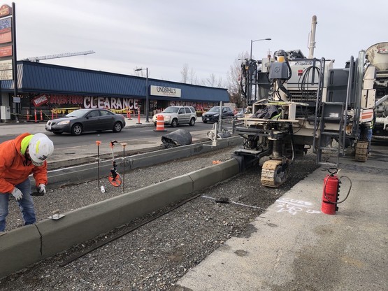 Crews work on a new concrete median on 196th St SW between 44th Ave W and 36th Ave W