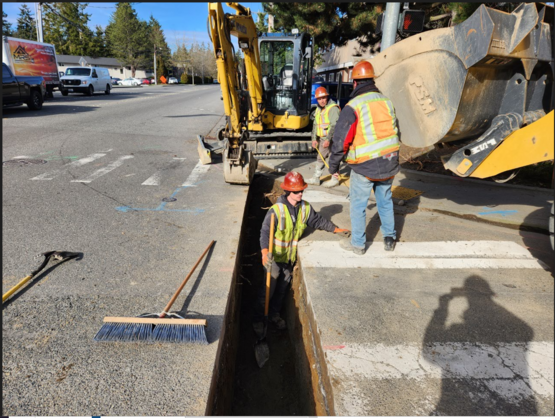 Crews excavating for signal crossings on the east side of Cedar Valley RD