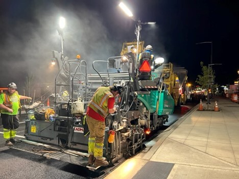 Crews pave 196th St SW at night