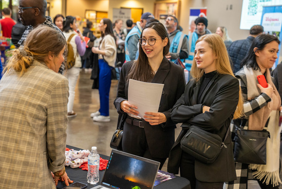 Lynnwood Job Fair - Job Seekers speaking to an employer