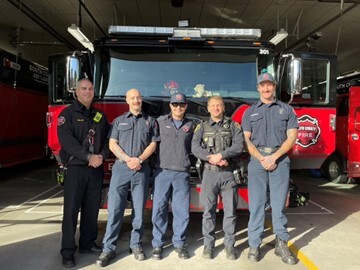 Officer Chris VanDomelen with members of South County Fire
