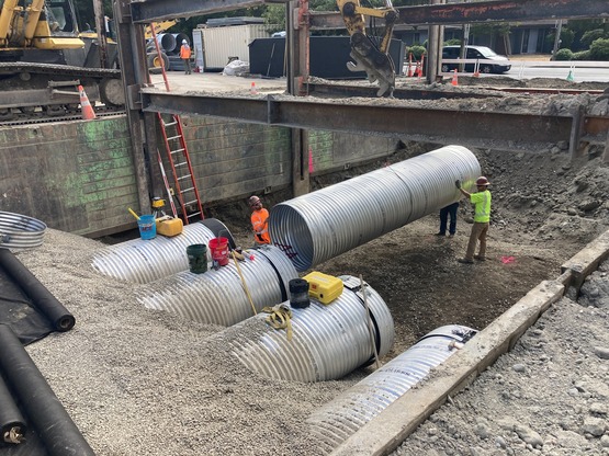 Installing Corrugated Metal Pipes for Storm Water Detention System