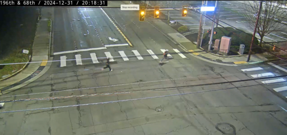 Suspects running across 196th Street SW and 68th Ave West