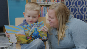 Port Orchard, WA, mother reads to her young son