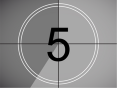 Number 5 in a white circle and a grey background