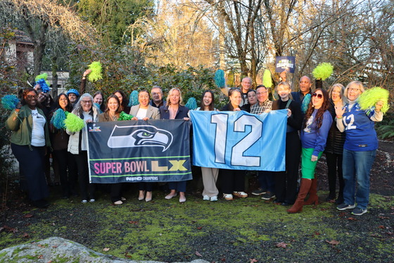 Board and staff with Seahawks