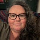 Angela Quiram ("Q")