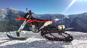 Photo of "timber sled" or snowbike in the snow