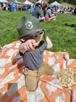 Kid with ranger hat at festival