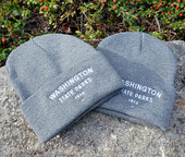 Gray woven beanie with white embroidered logo.