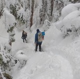 Snowshoers in deep snow