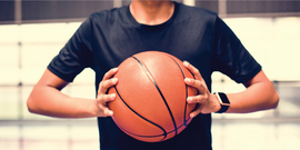 Teen holding basketball