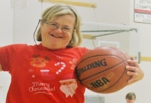 woman holding basketball