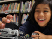 student building a LEGO robot