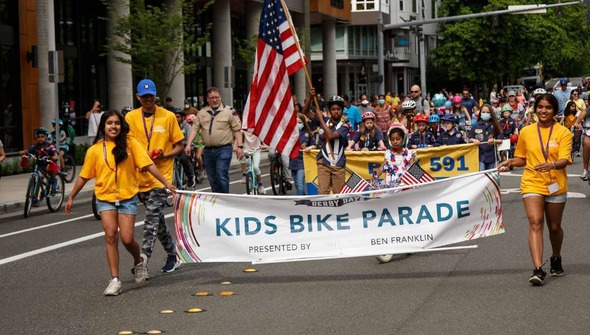 Volunteers leading the derby days parade