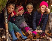 Children playing in the woods